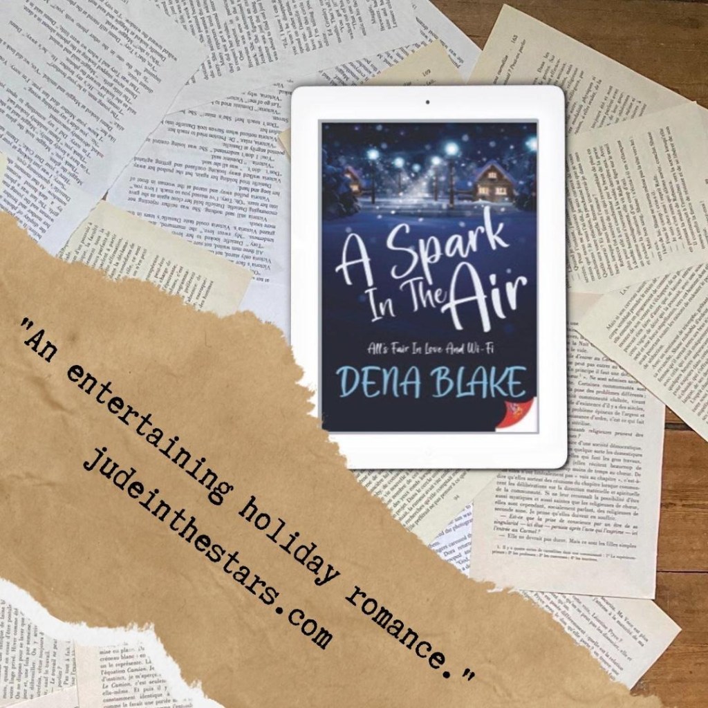 On a backdrop of book pages, an iPad with the cover of A Spark in the Air by Dena Blake. At the bottom of the image, a strip of torn paper with a quote: "An entertaining holiday romance." and a URL: judeinthestars.com.